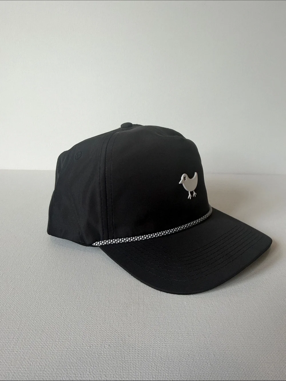 Bad Birdie Black Cap with White Bird Emblem